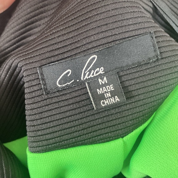 Black blazer by C.Luce with kiwi green lining.